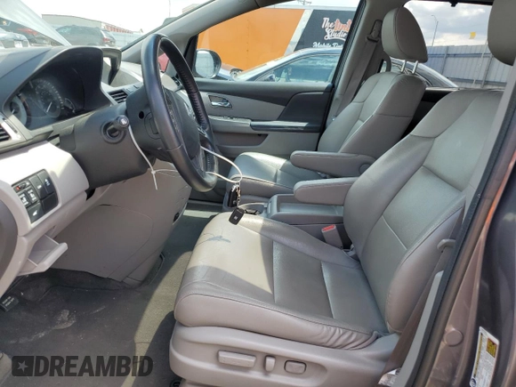 2016 Honda Odyssey EX-L z VIN 5FNRL5H65GB017067, wystawiony jako Copart lot #58424235 z przebiegiem 89 988 mil mil oraz Szkoda całkowita • Salvage title. Historia ofert i sprzedaży dostępna na DreamBid. Obrazek 7.