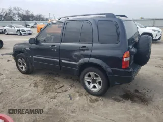 2003 Suzuki Grand Vitara z VIN JS3TE62V834101506, wystawiony jako Copart lot #47094765 z przebiegiem 240 778 mil mil oraz Szkoda całkowita • Salvage title. Historia ofert i sprzedaży dostępna na DreamBid. Obrazek 2.