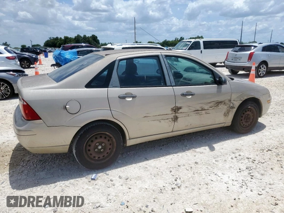 2006 Ford Focus S with VIN 1FAFP34N26W225772, listed as a Copart auction lot 62657045 with 117,078 mi miles and Salvage title. Bid and sale history available at DreamBid. Image 3.