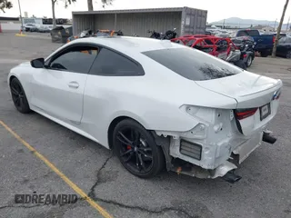 2022 BMW 4 Series 430i with VIN WBA53AP02NCK91287, listed as a IAAI auction lot 41448686 with 27,046 mi miles and . Bid and sale history available at carsss.com. Image 3.