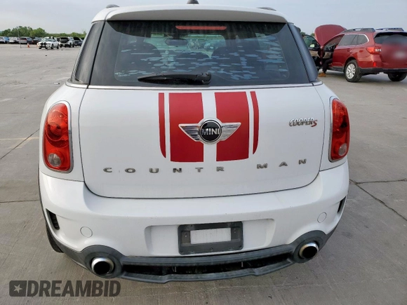 2014 MINI Countryman S with VIN WMWZC3C53EWT01161, listed as a Copart auction lot 50586965 with 151,813 mi miles and Salvage Title. Bid and sale history available at DreamBid. Image 6.