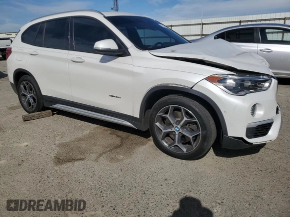 2016 BMW X1 xDrive28i z VIN WBXHT3C31GP880552, wystawiony jako Copart lot #52931305 z przebiegiem 127 225 mil mil oraz Szkoda całkowita • Salvage title. Historia ofert i sprzedaży dostępna na DreamBid. Obrazek 4.
