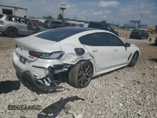 2020 BMW 8 Series M850i z VIN WBAGV8C06LBP48932, wystawiony jako Copart lot #57165015 z przebiegiem 55 731 mil mil oraz Szkoda całkowita • Salvage title. Historia ofert i sprzedaży dostępna na DreamBid. Obrazek 3.