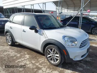 2012 MINI Countryman with VIN WMWZB3C53CWM02541, listed as a IAAI auction lot 41720086 with 99,820 mi miles and . Bid and sale history available at DreamBid. Image 1.