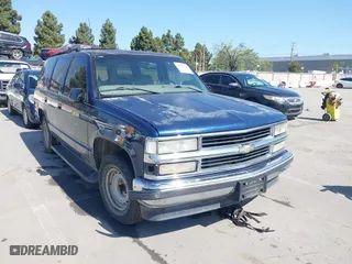 1999 Chevrolet Tahoe with VIN 1GNEC13R7XJ573387, listed as a IAAI auction lot 42001191 with 241,007 mi miles. Bid and sale history available at carsss.com. Image 6.