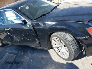 2012 Chrysler 300 C Luxury Series with VIN 2C3CCAPT4CH289639, listed as a IAAI auction lot 40634352 with 118,958 mi miles and . Bid and sale history available at carsss.com. Image 6.