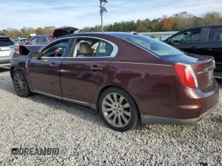 2012 Lincoln MKS with VIN 1LNHL9ERXCG801273, listed as a Copart auction lot 82476574 with 203,370 mi miles and Salvage Title. Bid and sale history available at DreamBid. Image 2.