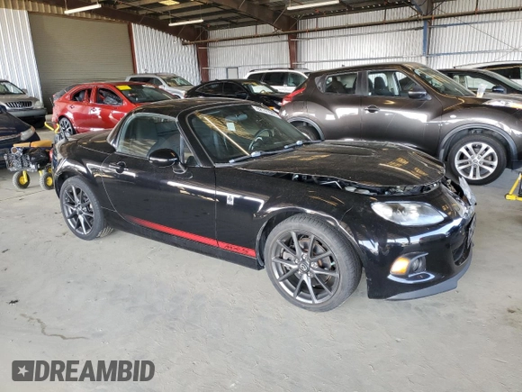 2014 Mazda MX-5 Miata Club with VIN JM1NC2MF0E0235061, listed as a Copart auction lot 62741565 with 63,767 mi miles and Salvage title. Bid and sale history available at DreamBid. Image 4.