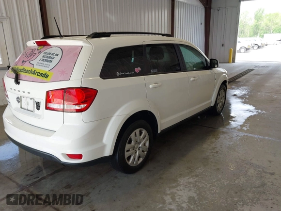 2019 Dodge Journey SE with VIN 3C4PDCBBXKT835029, listed as a IAAI auction lot 42120482 with 130,282 mi miles and . Bid and sale history available at DreamBid. Image 4.
