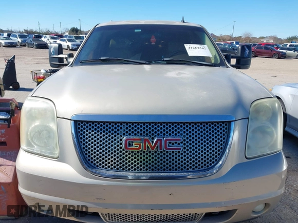 2007 GMC Yukon Denali z VIN 1GKFK63857J261948, wystawiony jako IAAI lot #41262362 z przebiegiem Nie podano mil oraz . Historia ofert i sprzedaży dostępna na DreamBid. Obrazek 6.