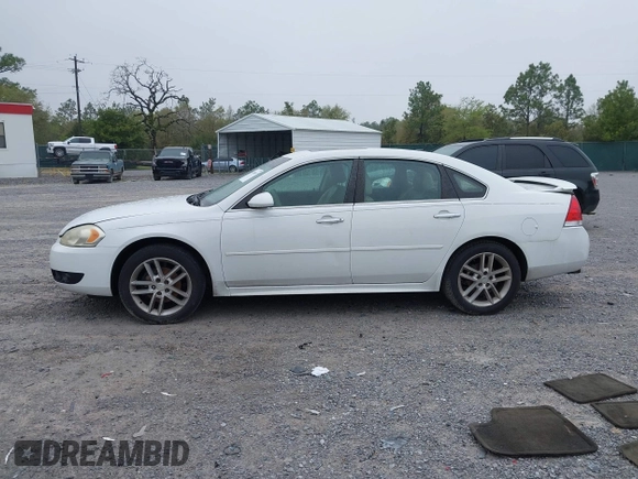 2013 Chevrolet Impala LTZ with VIN 2G1WC5E39D1202260, listed as a IAAI auction lot 41908155 with 210,193 mi miles and . Bid and sale history available at DreamBid. Image 14.