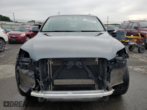 2014 Audi Q7 Premium Plus with VIN WA1LMAFE8ED015737, listed as a Copart auction lot 62099545 with 129,505 mi miles and Salvage title. Bid and sale history available at DreamBid. Image 5.