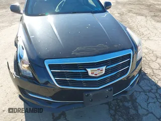 2016 Cadillac ATS Standard AWD z VIN 1G6AG5RX5G0103585, wystawiony jako IAAI lot #41439995 z przebiegiem 58 615 mil mil oraz . Historia ofert i sprzedaży dostępna na DreamBid. Obrazek 10.
