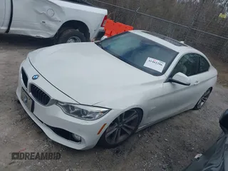 2016 BMW 4 Series 435i xDrive with VIN WBA3R5C52GK373771, listed as a IAAI auction lot 41462286 with 123,713 mi miles and . Bid and sale history available at DreamBid. Image 2.