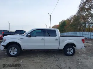2013 Ford F-150 XL with VIN 1FTFW1ET7DFD22929, listed as a IAAI auction lot 40937321 with 202,995 mi miles. Bid and sale history available at carsss.com. Image 14.