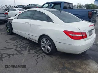 2010 Mercedes-Benz E with VIN WDDKJ5GB0AF005357, listed as a IAAI auction lot 42020474 with 133,117 mi miles. Bid and sale history available at carsss.com. Image 3.