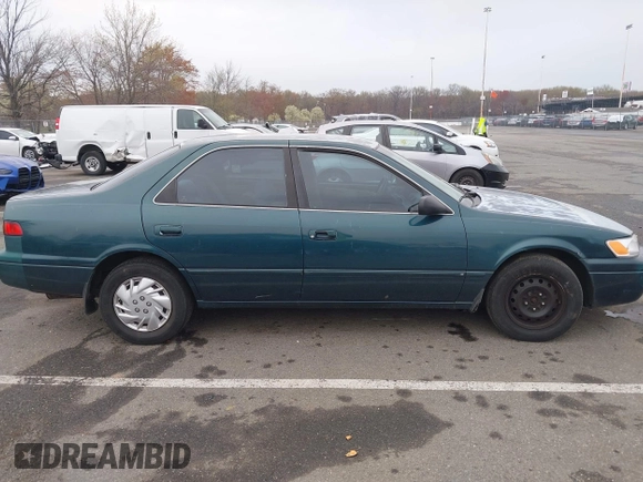 1997 Toyota Camry LE z VIN 4T1BG22K5VU024448, wystawiony jako IAAI lot #42019670 z przebiegiem 133 385 mil mil oraz . Historia ofert i sprzedaży dostępna na DreamBid. Obrazek 13.