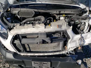 2020 Ford Transit Cargo with VIN 1FTBR2C87LKB75849, listed as a Copart auction lot 79414554 with 56,987 mi miles and Salvage Title. Bid and sale history available at carsss.com. Image 12.