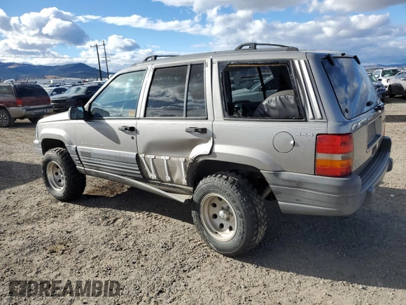1998 Jeep Grand Cherokee Laredo with VIN 1J4GZ58S7WC316522, listed as a Copart auction lot 80201994 with 217,465 mi miles and Clean Title. Bid and sale history available at carsss.com. Image 2.