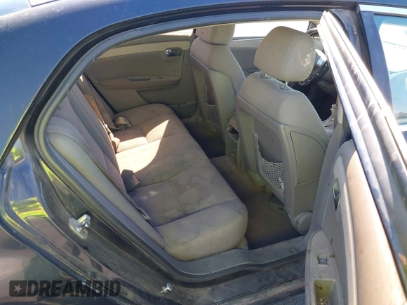 2009 Chevrolet Malibu 1LS with VIN 1G1ZG57B79F181527, listed as a IAAI auction lot 41885741 with 161,126 mi miles and . Bid and sale history available at DreamBid. Image 8.