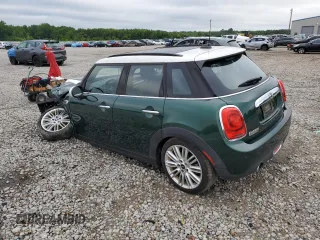 2018 MINI Hardtop 4 Door Cooper with VIN WMWXU1C56J2F79128, listed as a Copart auction lot 60848735 with 35,392 mi miles and Salvage title. Bid and sale history available at DreamBid. Image 2.