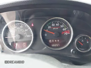 2013 Jeep Wrangler Rubicon 10th Anniversary with VIN 1C4BJWCG2DL651815, listed as a IAAI auction lot 41643919 with 98,297 mi miles and . Bid and sale history available at DreamBid. Image 7.