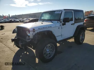 2015 Jeep Wrangler Rubicon with VIN 1C4BJWCG3FL690660, listed as a Copart auction lot 79571534 with 74,058 mi miles and Salvage title. Bid and sale history available at DreamBid. Image 1.