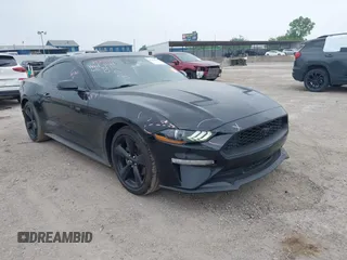 2023 Ford Mustang EcoBoost z VIN 1FA6P8TH1P5106126, wystawiony jako IAAI lot #42252165 z przebiegiem 122 040 mil mil oraz . Historia ofert i sprzedaży dostępna na DreamBid. Obrazek 1.