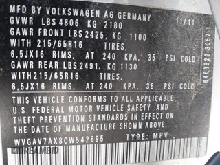 2012 Volkswagen Tiguan SE z VIN WVGAV7AX8CW542695, wystawiony jako IAAI lot #42270445 z przebiegiem 125 419 mil mil oraz . Historia ofert i sprzedaży dostępna na DreamBid. Obrazek 9.