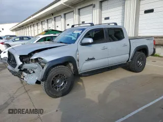 2019 Toyota Tacoma SR z VIN 3TMCZ5ANXKM275837, wystawiony jako Copart lot #56465065 z przebiegiem 72 182 mil mil oraz Szkoda całkowita • Salvage title. Historia ofert i sprzedaży dostępna na DreamBid. Obrazek 1.