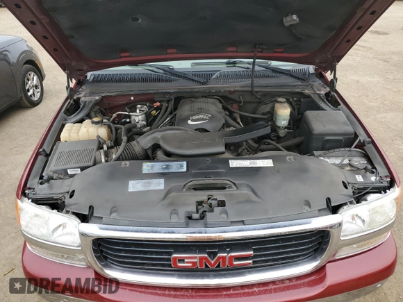 2001 GMC Yukon SLT z VIN 1GKEC13T21J302687, wystawiony jako Copart lot #80982344 z przebiegiem 139 565 mil mil oraz Szkoda całkowita • Salvage title. Historia ofert i sprzedaży dostępna na DreamBid. Obrazek 12.