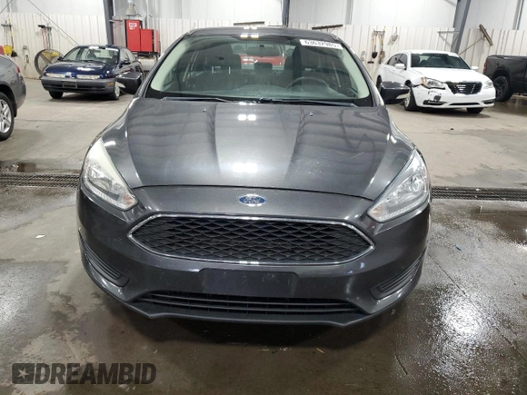 2017 Ford Focus SE with VIN 1FADP3F21HL205754, listed as a Copart auction lot 63632985 with 96,797 mi miles and Salvage title. Bid and sale history available at DreamBid. Image 5.