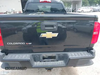 2019 Chevrolet Colorado 4WD Work Truck with VIN 1GCGTBEN5K1129922, listed as a IAAI auction lot 42476965 with 84,057 mi miles and . Bid and sale history available at DreamBid. Image 16.