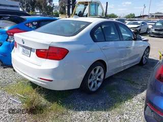 2015 BMW 3 Series 320i with VIN WBA3B1G56FNT06434, listed as a IAAI auction lot 41772918 with 76,782 mi miles. Bid and sale history available at carsss.com. Image 4.