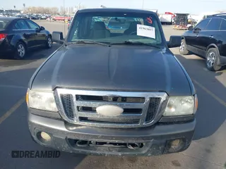 2009 Ford Ranger XLT with VIN 1FTZR45E79PA31145, listed as a IAAI auction lot 41963057 with 285,742 mi miles. Bid and sale history available at carsss.com. Image 6.