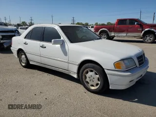 1999 Mercedes-Benz C 230/260/280/320 with VIN WDBHA24GXXA705698, listed as a Copart auction lot 54093535 with 184,453 mi miles and Clean Title. Bid and sale history available at carsss.com. Image 4.