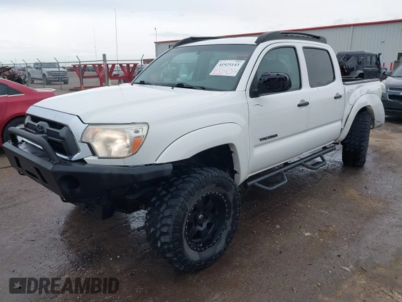 2014 Toyota Tacoma with VIN 3TMLU4EN8EM139665, listed as a IAAI auction lot 41925143 with 190,690 mi miles and . Bid and sale history available at DreamBid. Image 2.