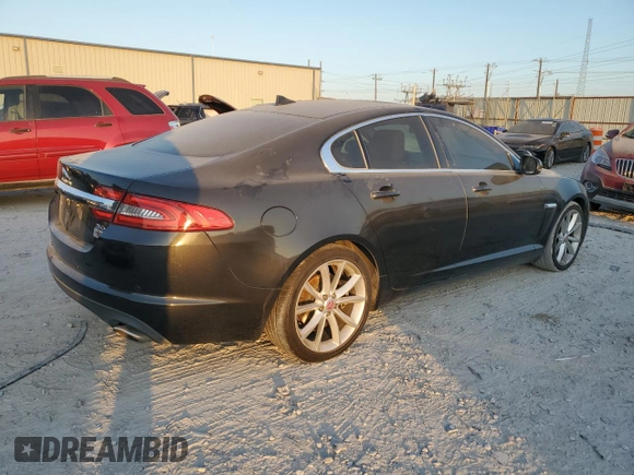 2015 Jaguar XF V6 Portfolio with VIN SAJWA0F76F8U59802, listed as a Copart auction lot 77198104 with 98,859 mi miles and Clean Title. Bid and sale history available at carsss.com. Image 3.