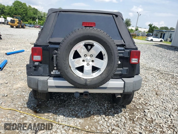 2008 Jeep Wrangler Unlimited Sahara with VIN 1J4GA59178L607960, listed as a Copart auction lot 57855995 with 122,913 mi miles and Salvage title. Bid and sale history available at DreamBid. Image 6.