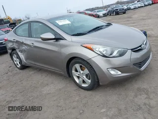 2013 Hyundai Elantra GLS z VIN 5NPDH4AE7DH310795, wystawiony jako IAAI lot #41613232 z przebiegiem 121 166 mil mil oraz . Historia ofert i sprzedaży dostępna na DreamBid. Obrazek 1.