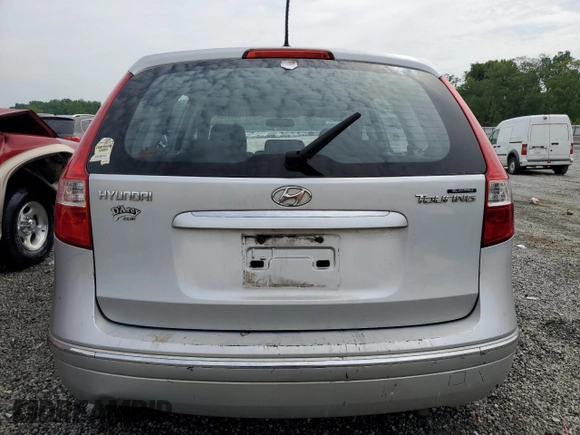 2009 Hyundai Elantra Touring z VIN KMHDC86E29U038194, wystawiony jako Copart lot #57483375 z przebiegiem 218 337 mil mil oraz Szkoda całkowita • Salvage title. Historia ofert i sprzedaży dostępna na DreamBid. Obrazek 6.