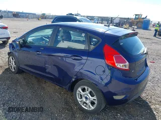 2016 Ford Fiesta SE z VIN 3FADP4EJ8GM150098, wystawiony jako IAAI lot #41890402 z przebiegiem 126 492 mil mil oraz . Historia ofert i sprzedaży dostępna na DreamBid. Obrazek 3.