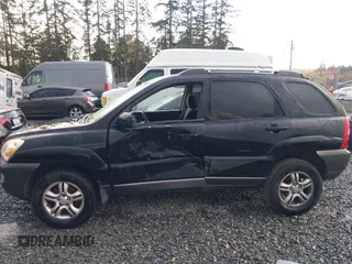 2005 Kia Sportage LX with VIN KNDJF723557054234, listed as a IAAI auction lot 40652851 with 220,215 mi miles and . Bid and sale history available at carsss.com. Image 6.