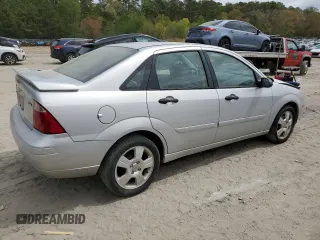 2006 Ford Focus S with VIN 1FAHP34N56W109006, listed as a Copart auction lot 53987745 with 111,677 mi miles and Salvage Title. Bid and sale history available at carsss.com. Image 3.