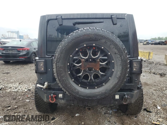 2016 Jeep Wrangler Unlimited Sport z VIN 1C4BJWDG4GL194296, wystawiony jako Copart lot #59397285 z przebiegiem 174 343 mil mil oraz Szkoda całkowita • Salvage title. Historia ofert i sprzedaży dostępna na DreamBid. Obrazek 6.