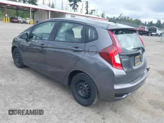 2019 Honda Fit LX with VIN 3HGGK5H41KM729820, listed as a IAAI auction lot 42603033 with 49,440 mi miles and . Bid and sale history available at DreamBid. Image 3.