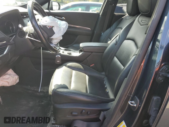 2021 Cadillac XT4 AWD Luxury with VIN 1GYFZBR48MF034573, listed as a Copart auction lot 51114315 with 53,066 mi miles and Salvage title. Bid and sale history available at DreamBid. Image 7.