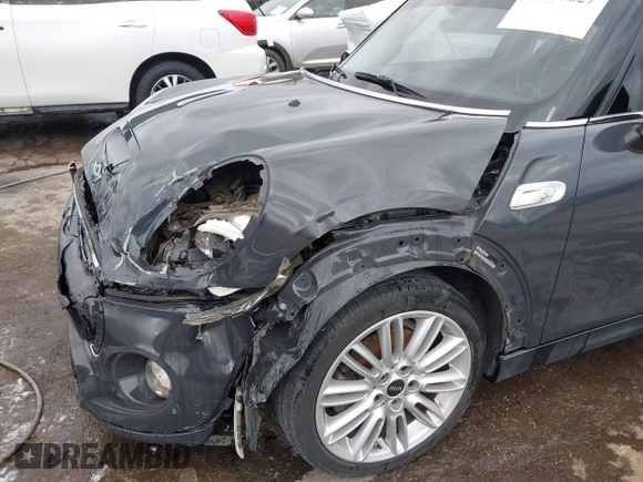 2017 MINI Hardtop 4 Door Cooper S z VIN WMWXU3C3XH2F49201, wystawiony jako IAAI lot #41837027 z przebiegiem 75 949 mil mil oraz . Historia ofert i sprzedaży dostępna na DreamBid. Obrazek 6.