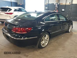 2015 Volkswagen CC R-Line with VIN WVWBP7AN8FE828106, listed as a IAAI auction lot 41867821 with 67,067 mi miles and . Bid and sale history available at DreamBid. Image 4.