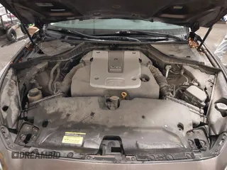 2015 Infiniti Q50 Premium z VIN JN1BV7ARXFM418280, wystawiony jako IAAI lot #42080879 z przebiegiem 126 411 mil mil oraz . Historia ofert i sprzedaży dostępna na DreamBid. Obrazek 10.